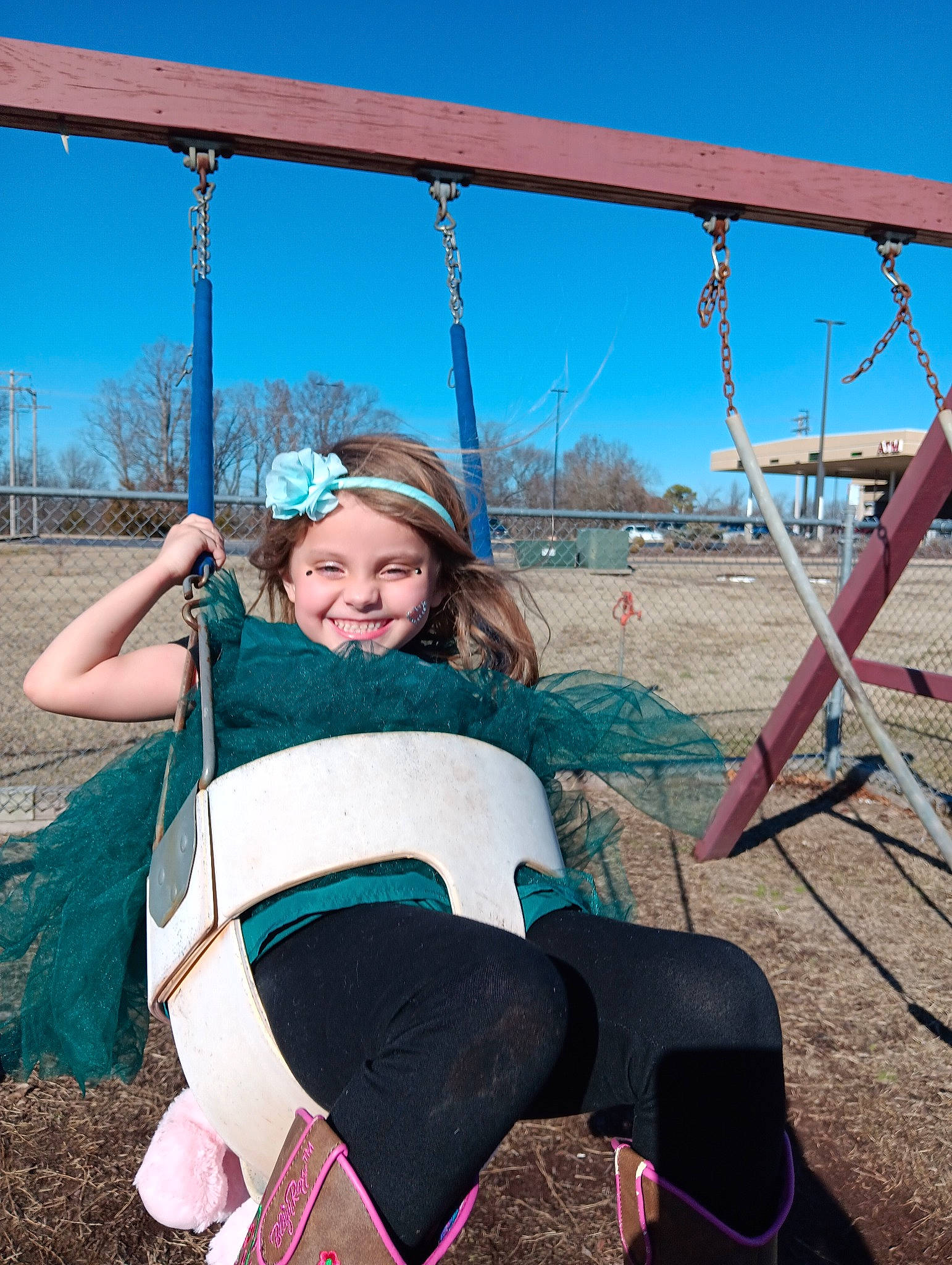 Addilynn joined the competition — help win amazing prizes! beauty, black, clothing, fun, grass, happy, headwear, human_body, joy, knee, leg, leisure, person, photograph, pink, playground, public_space, recreation, sky, smile