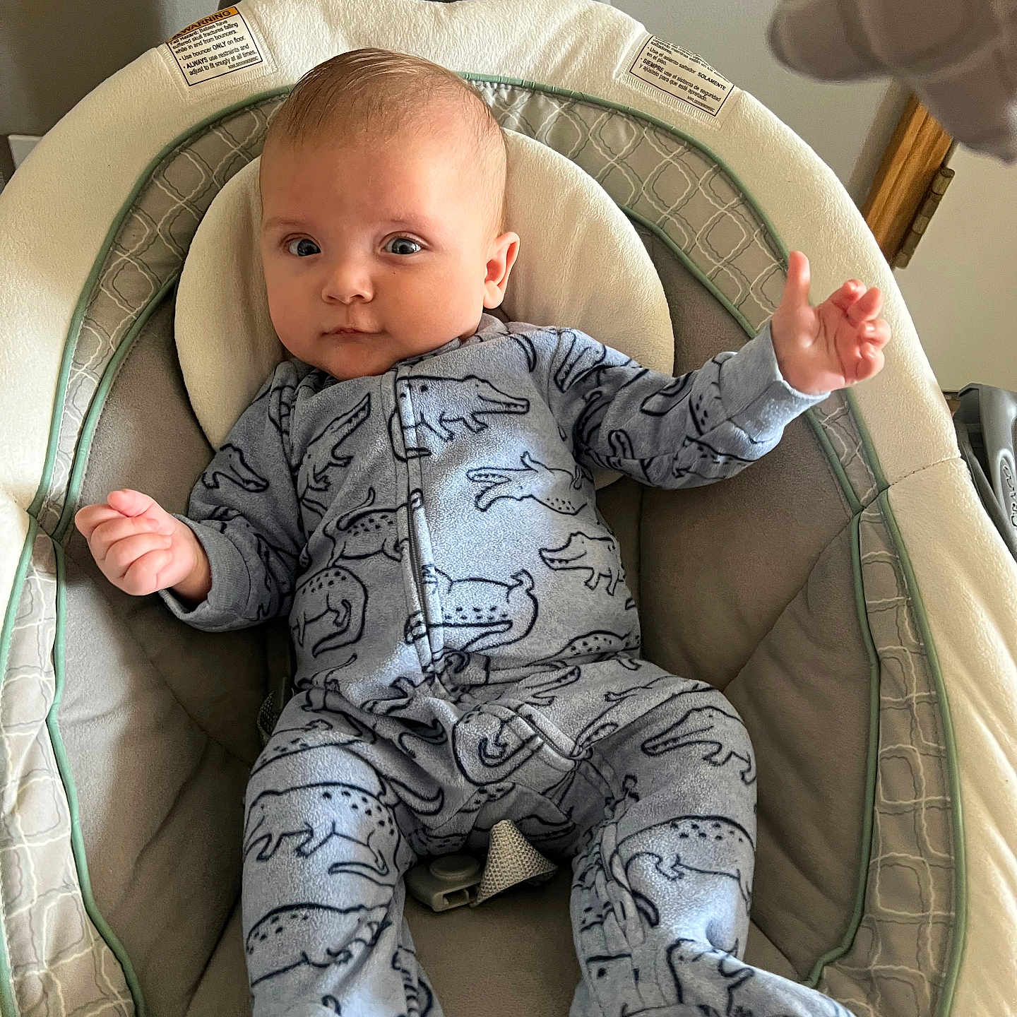 Mason is registered to the contest to win money with this photo: baby, blanket, bodypart, clothing, crib, cushion, face, finger, furniture, hand, happy, head, homedecor, infantbed, pajamas, pants, person, photography, portrait, smile