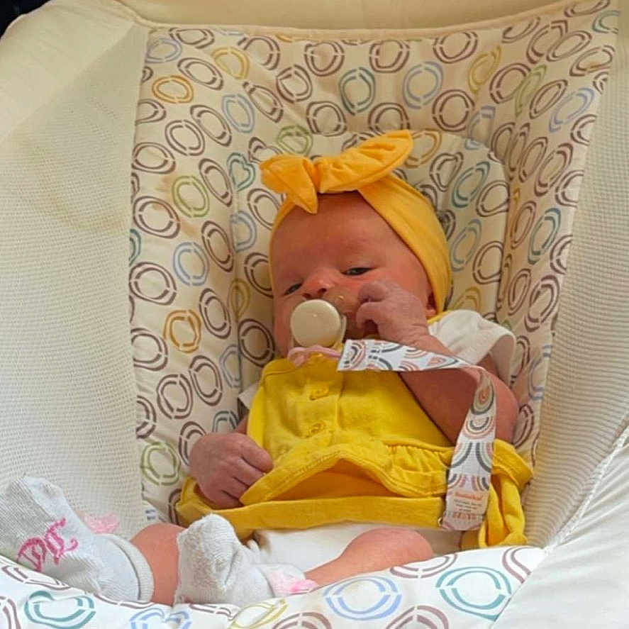 Aiyanna joined the competition — help win amazing prizes! baby, bed, blanket, bonnet, clothing, cradle, crib, cushion, face, furniture, hat, head, homedecor, infantbed, newborn, person, photography, portrait, sleeping