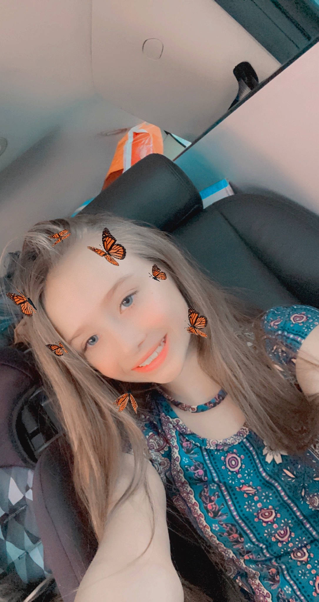 Karleigh is registered to the contest to win money with this photo: auto_part, automotive_design, automotive_lighting, black_hair, brown_hair, cap, electric_blue, eyebrow, eyelash, fashion_design, flash_photography, happy, hat, joy, lip, lipstick, long_hair, mouth, person, skin