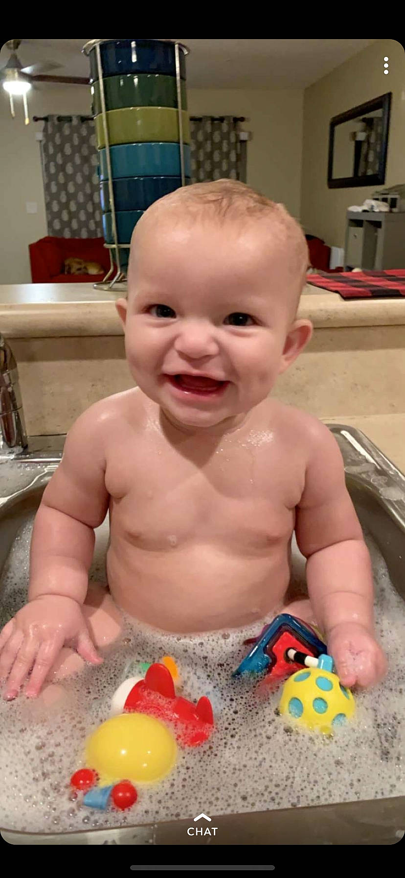 Emma Rose is registered to the contest to win money with this photo: baby, baby_bathing, baby_making_funny_faces, bathing, bathtub, cheek, child, face, facial_expression, fun, head, joy, mouth, person, play, skin, smile, toddler, toy, washing