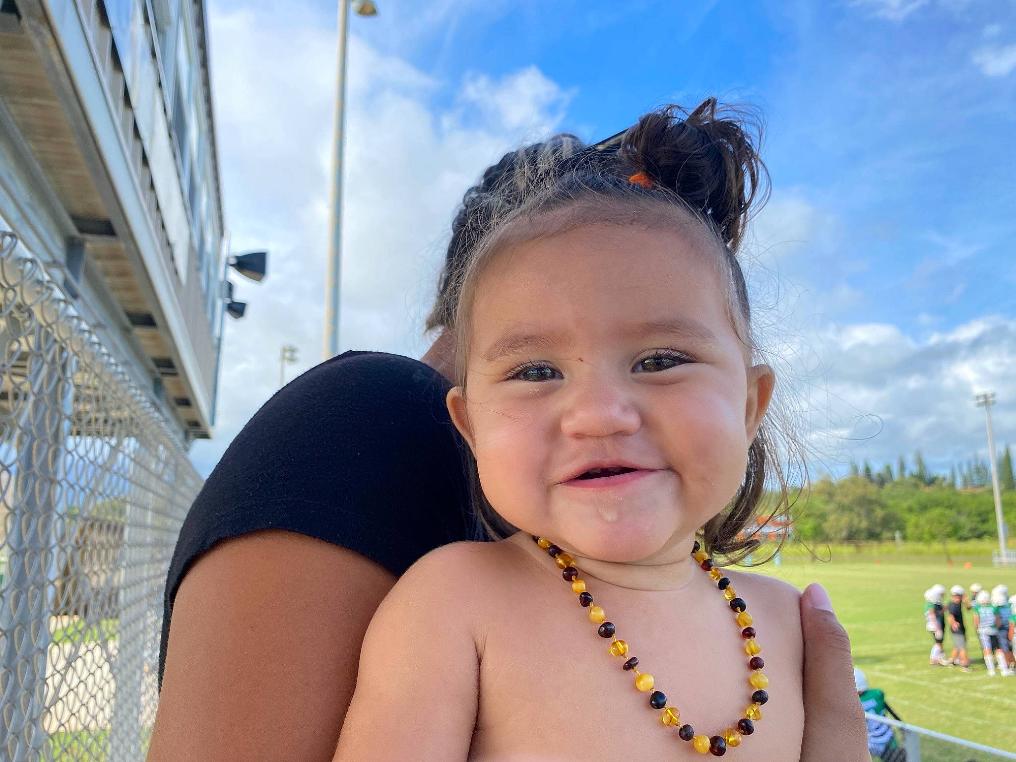 Aleyhna is registered to the contest to win money with this photo: azure, baby, chest, cloud, daytime, eyebrow, fun, grass, happy, headwear, iris, jewellery, joy, leisure, lip, people, person, plant, skin, sky