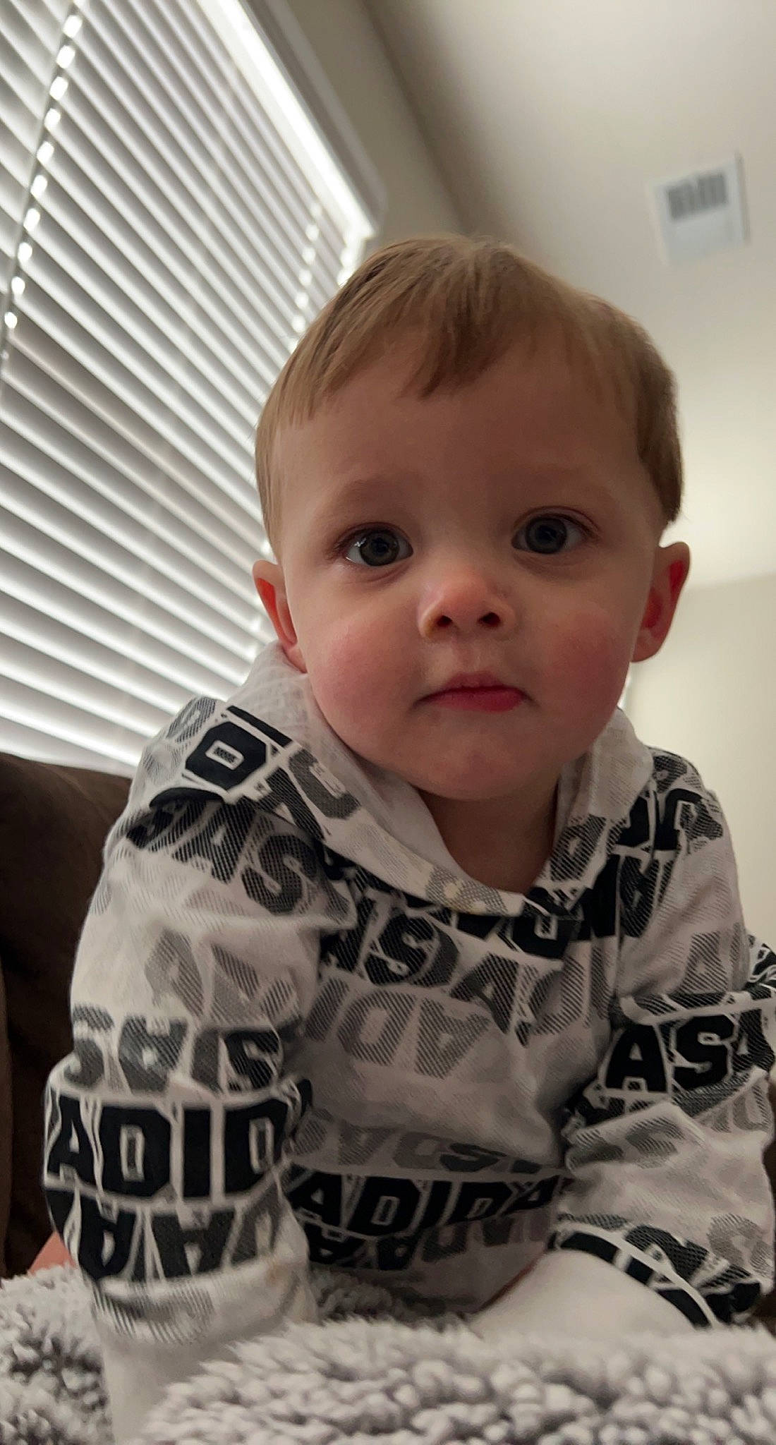 Lincoln joined the competition — help win amazing prizes! baby, baby_toddler_clothing, cheek, child, chin, comfort, eye, eyebrow, facial_expression, flooring, forehead, head, iris, jaw, lip, nose, person, skin, sleeve, t_shirt