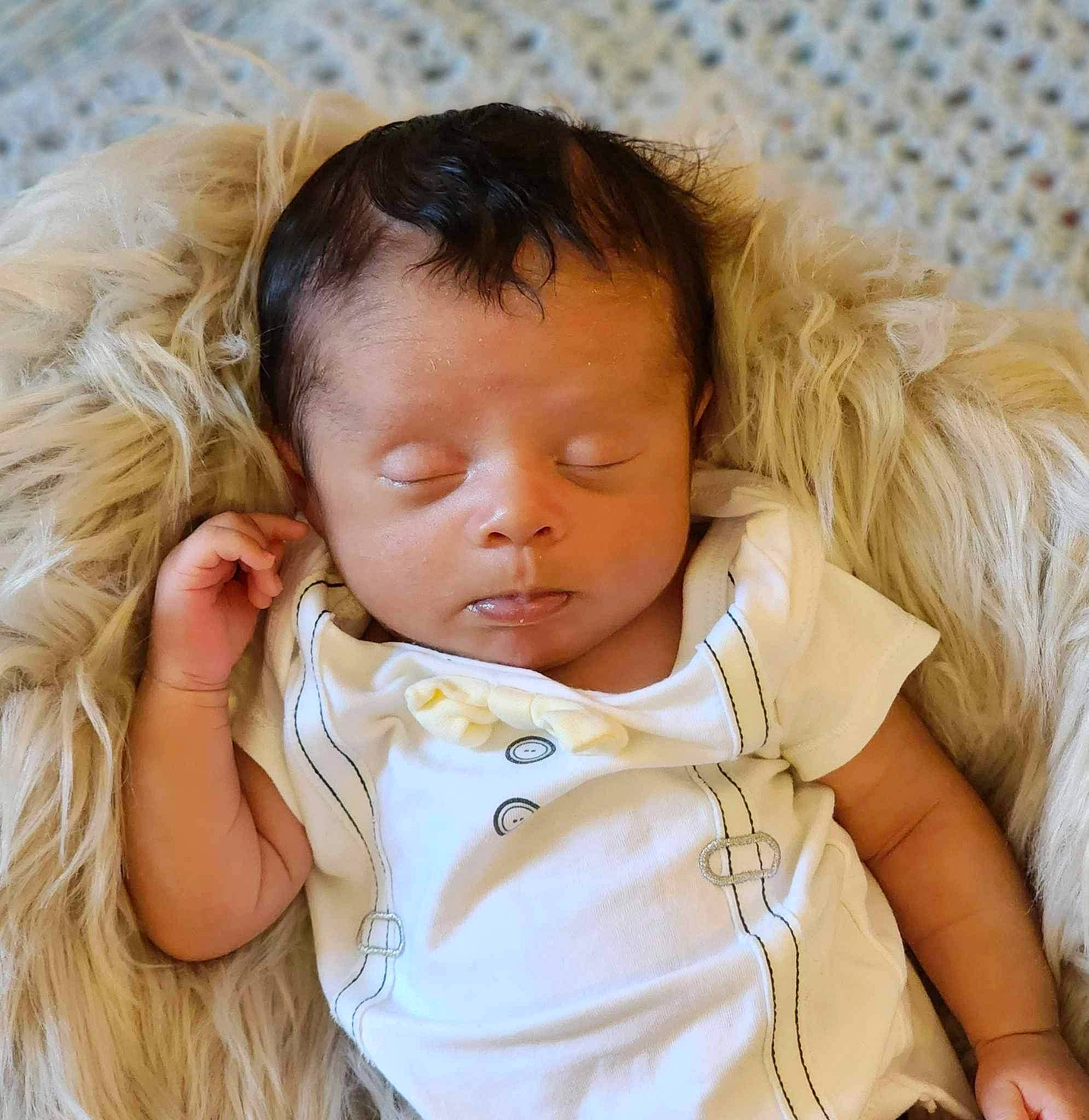 Julius is registered to the contest to win money with this photo: baby_toddler_clothing, cheek, chin, ear, eye, eyebrow, eyelash, face, finger, gesture, happy, head, iris, lip, mammal, neck, nose, person, skin, sleeve