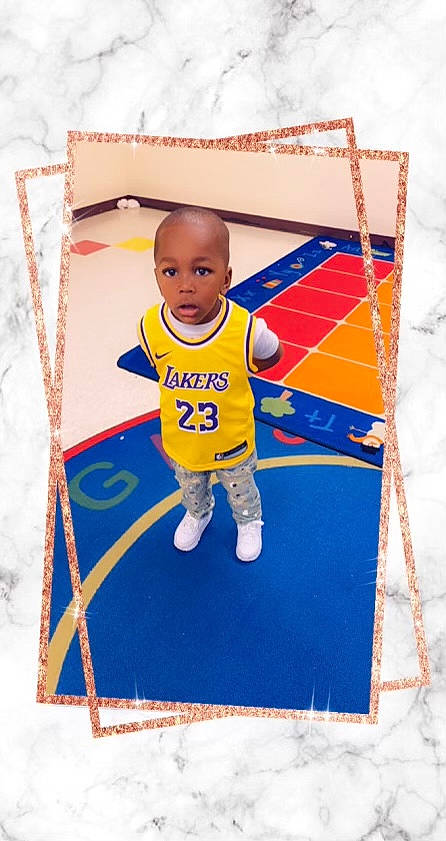 Taylin joined the competition — help win amazing prizes! baby, baby_products, baby_toddler_clothing, carpet, child, electric_blue, floor, flooring, fun, linens, logo, pattern, person, play, recreation, rectangle, room, sleeve, sportswear, t_shirt