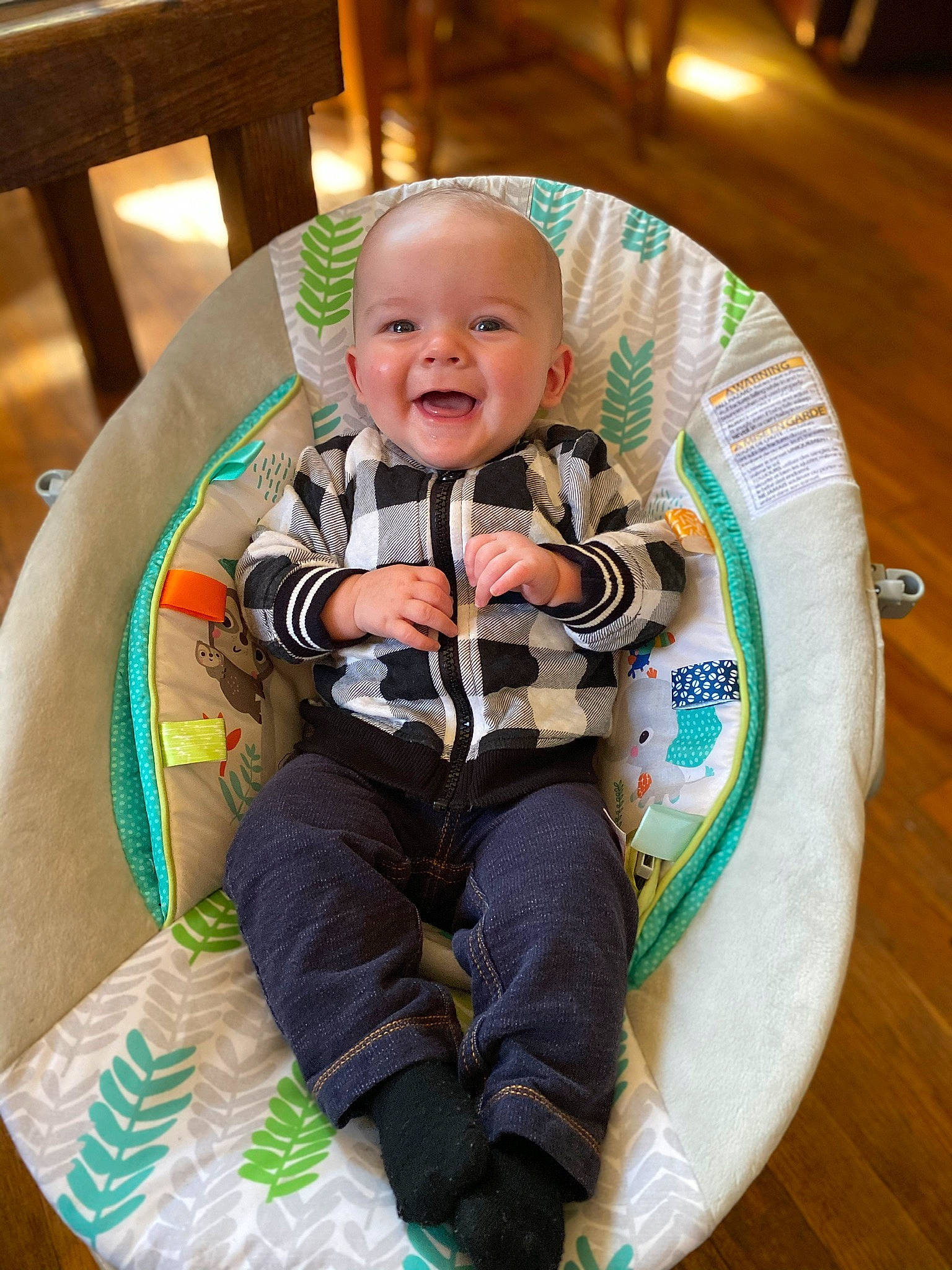 Jayce is registered to the contest to win money with this photo: baby, baby_products, baby_toddler_clothing, chair, child, circle, comfort, event, fun, happy, hardwood, head, lap, laugh, leisure, person, play, sitting, smile, toddler