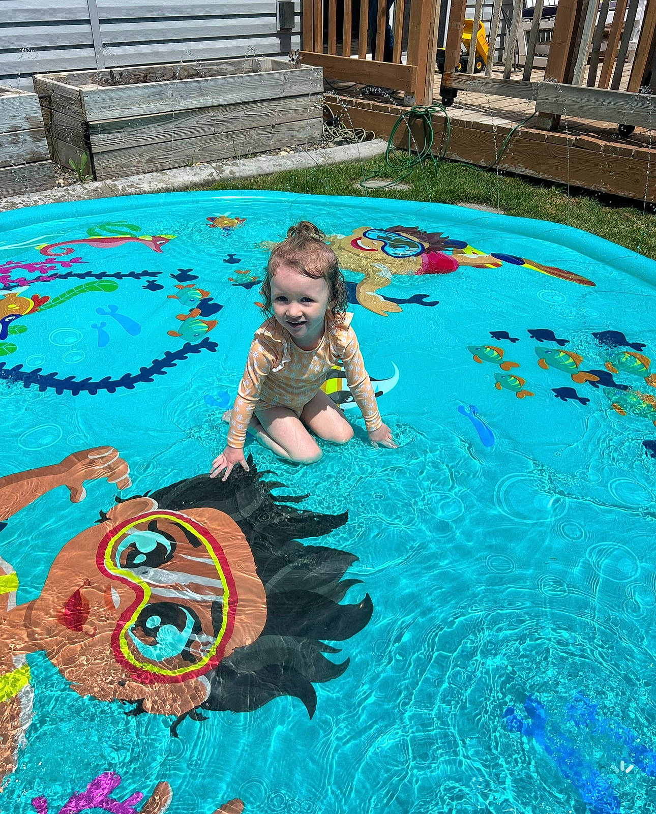 Izabella is registered to the contest to win money with this photo: aqua, baby_float, bathing, child, circle, event, fun, games, happy, leisure, leisure_centre, nonbuilding_structure, person, play, recreation, resort_town, rose, swimming_pool, toddler, vacation