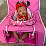baby, infant, red_bow, headband, pink_chair, polka_dots, mickey_mouse, baby_seat, baby_clothing, baby_accessory, child, cute, indoors, carpet, feet, anklet, pink, toy, comfortable, portrait