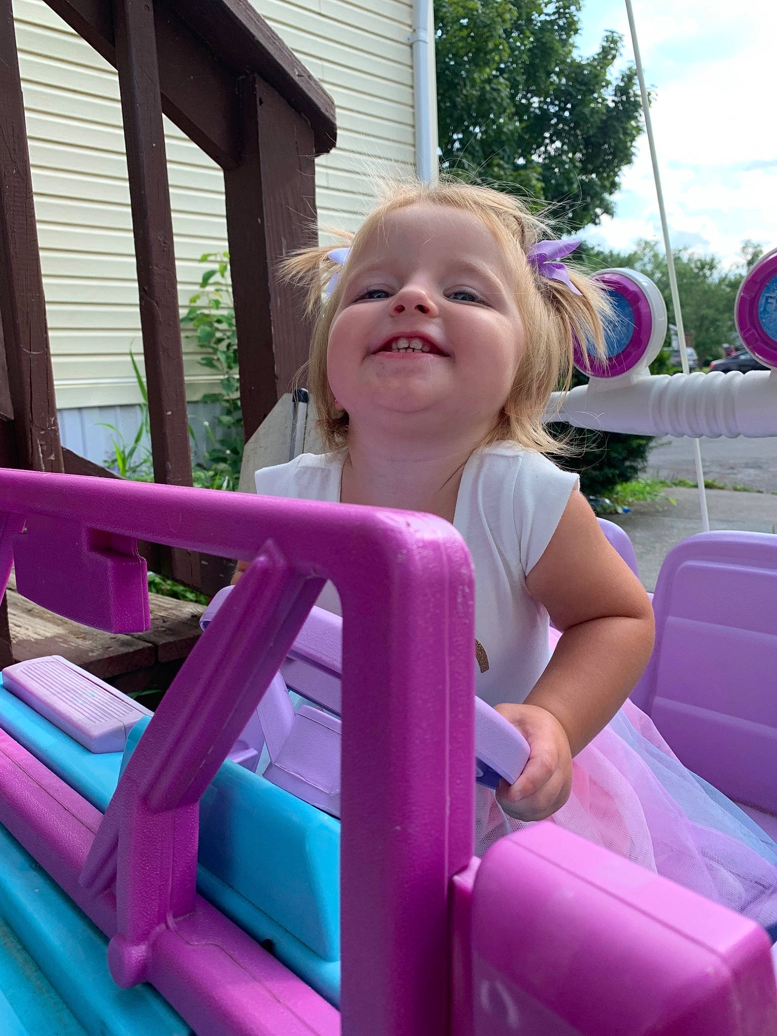 Sophiah joined the competition — help win amazing prizes! child, fun, headwear, joy, leisure, magenta, outdoor_play_equipment, person, pink, play, playground, public_space, purple, recreation, sitting, smile, summer, vacation