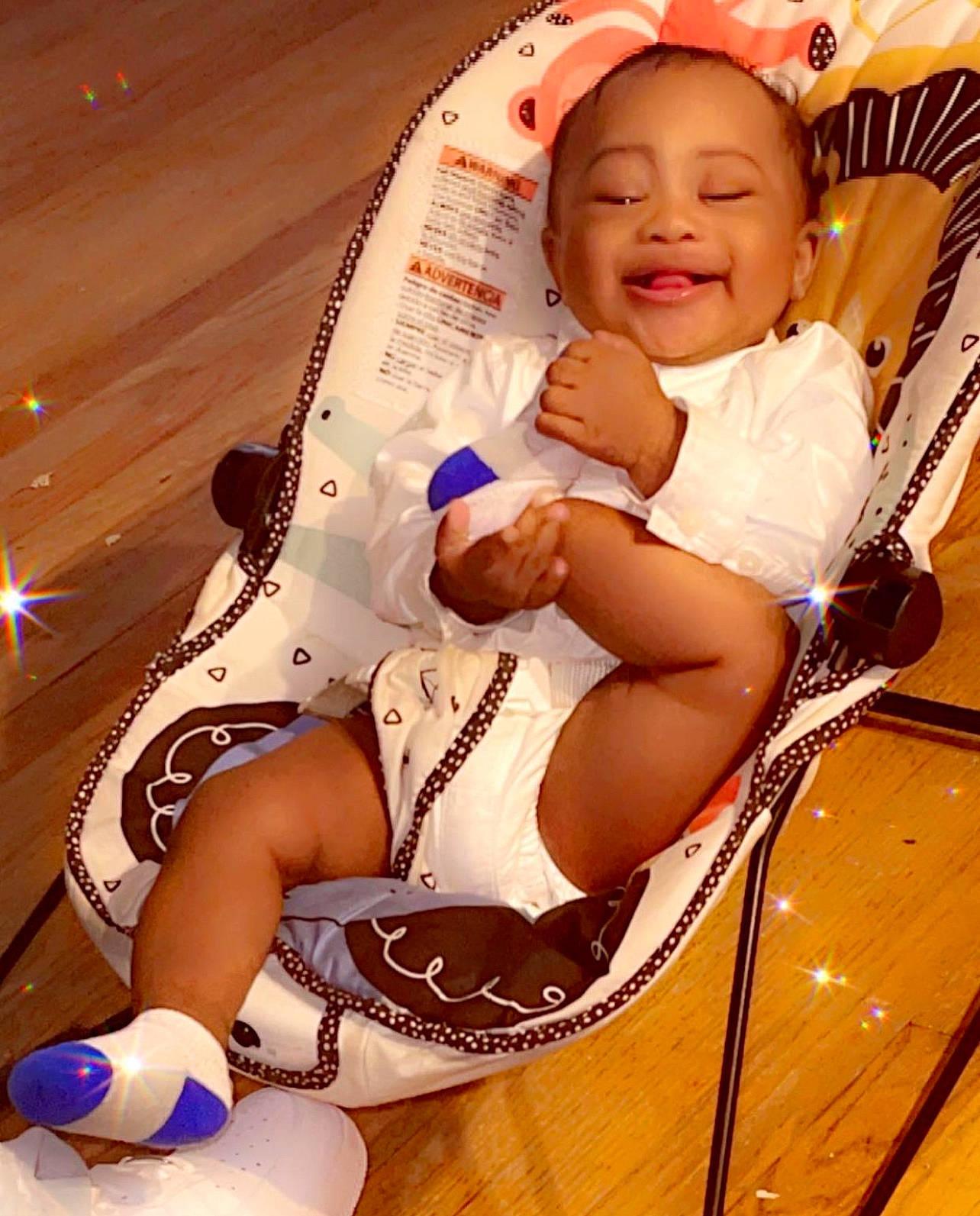 Lamar is registered to the contest to win money with this photo: abdomen, baby, baby_carriage, baby_products, baby_toddler_clothing, chest, child, comfort, event, fashion_accessory, fun, happy, human_leg, joy, knee, pattern, person, sitting, smile, thigh