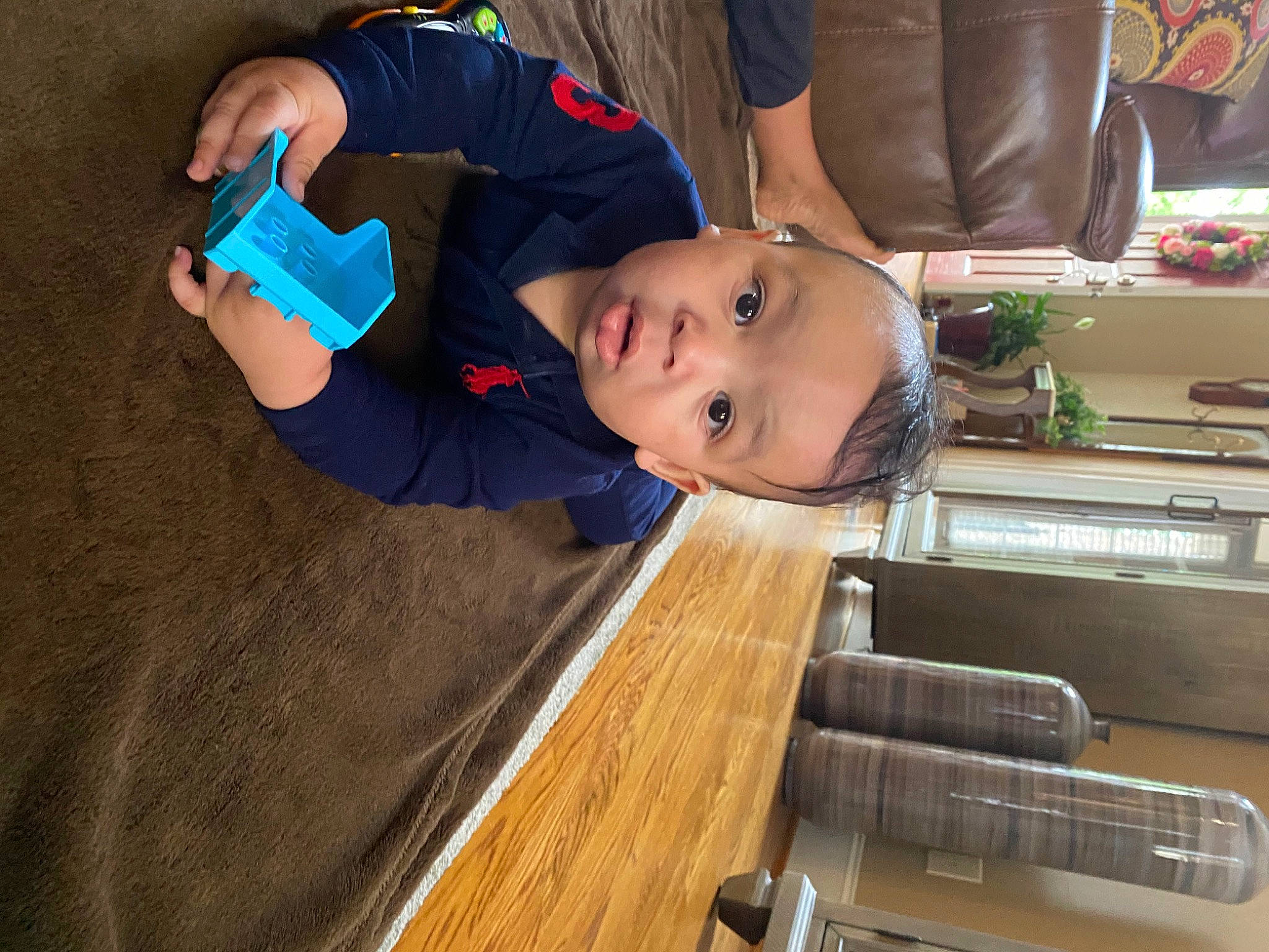 Legend joined the competition — help win amazing prizes! arm, baby, baby_toddler_clothing, child, electric_blue, flooring, fun, hardwood, hat, person, room, t_shirt, table, toddler, varnish, wood, wood_flooring, wood_stain