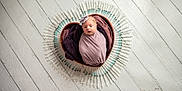 Aria joined the competition — help win amazing prizes! artistic, baby, blanket, circle, cute, headband, heart_shaped_bowl, indoors, infant, medical_theme, newborn, portrait, purple_blanket, small, studio_photo, swaddled, syringes, white_floor, wooden_floor, wrapped