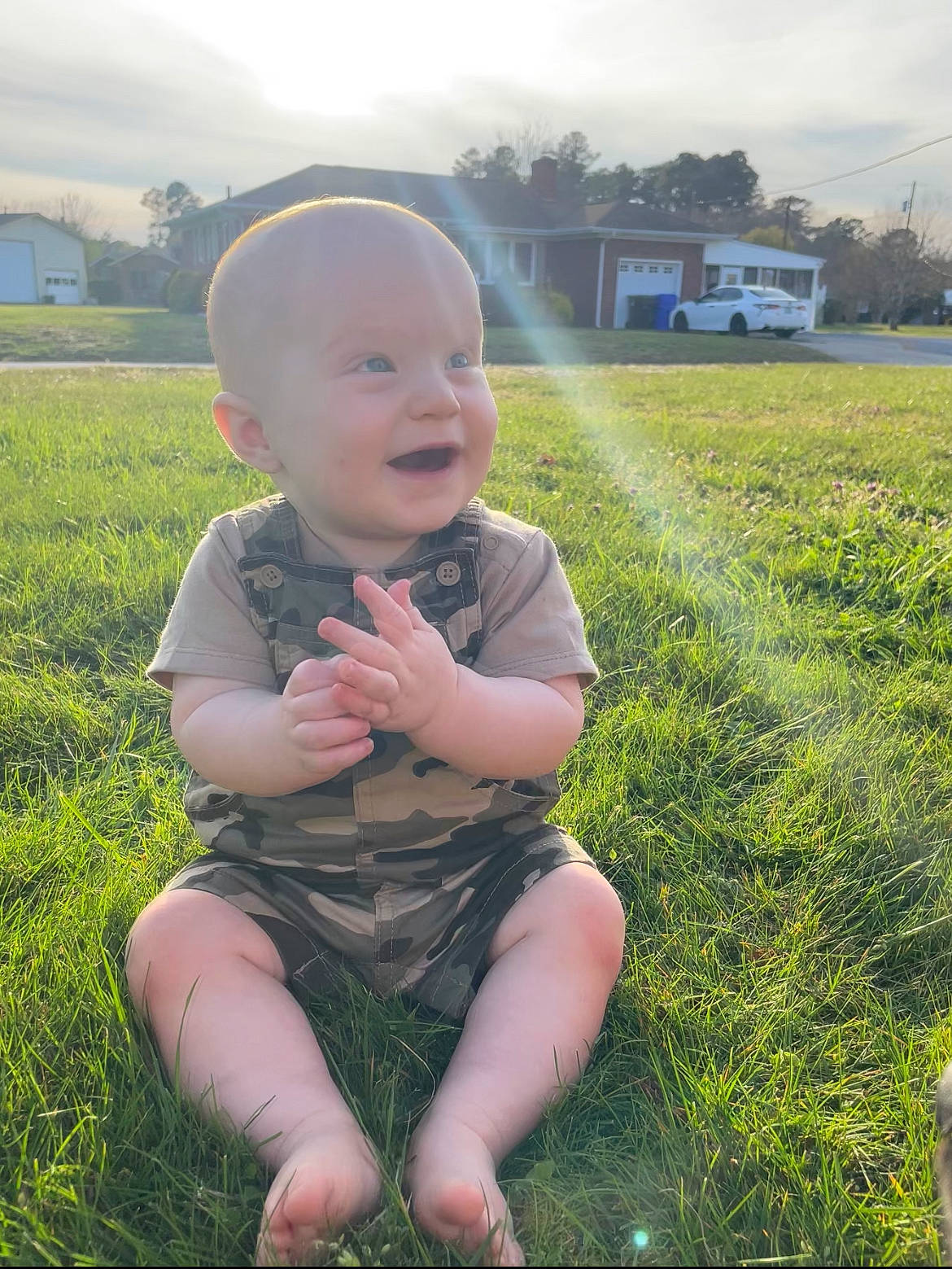 Joe is registered to the contest to win money with this photo: baby, baby_toddler_clothing, cloud, fun, grass, grassland, happy, leaf, morning, natural_environment, nature, people_in_nature, person, plant, skin, sky, smile, sunlight, toddler, tree