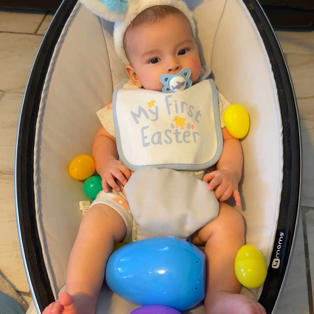 Enzo is registered to the contest to win money with this photo: baby, balloon, bed, clothing, cradle, crib, cushion, diaper, face, furniture, hat, head, homedecor, indoors, infantbed, newborn, person, photography, portrait, toy