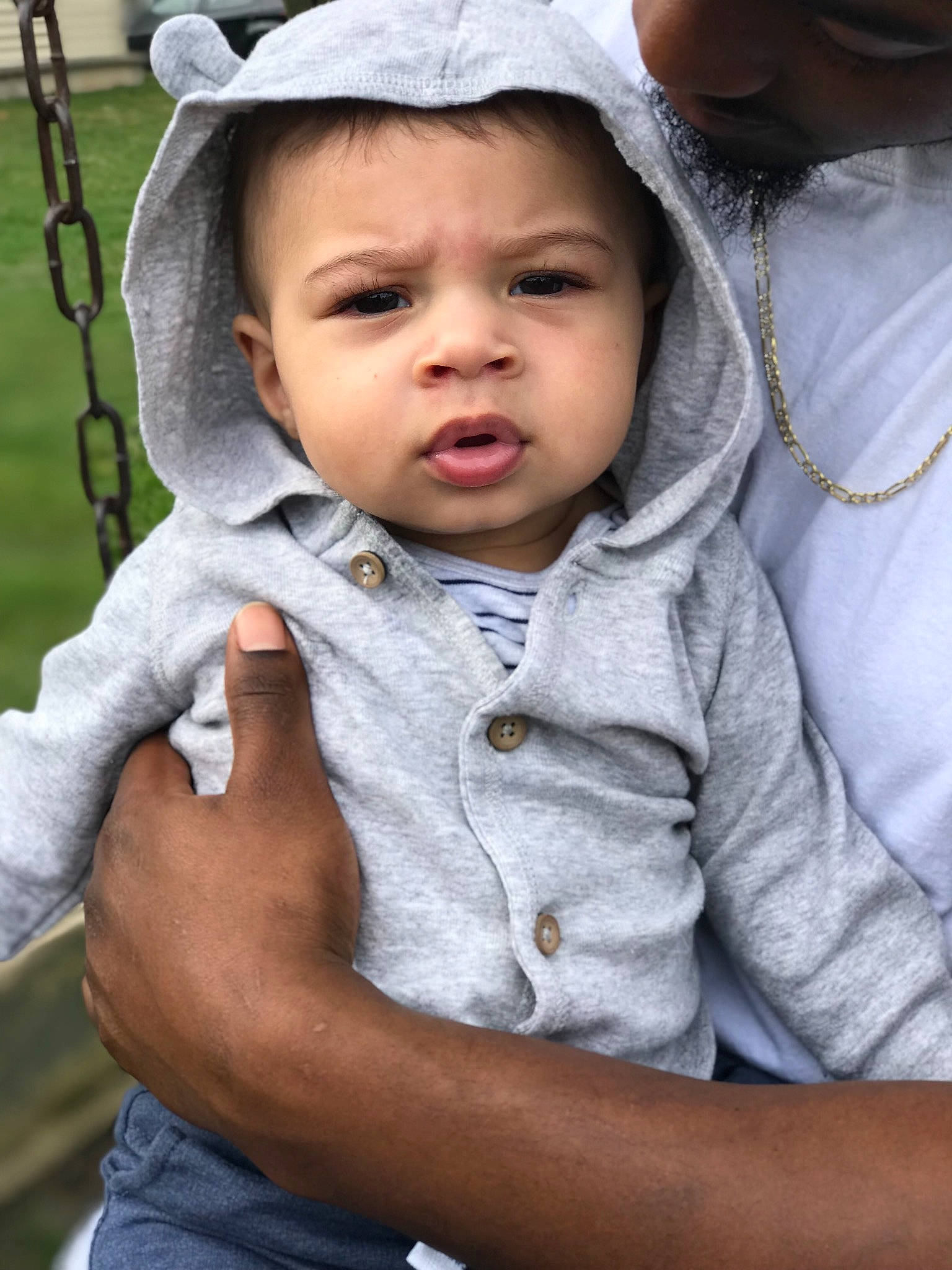 Craig is registered to the contest to win money with this photo: baby, cheek, child, hat, headgear, outerwear, person, skin, smile, toddler