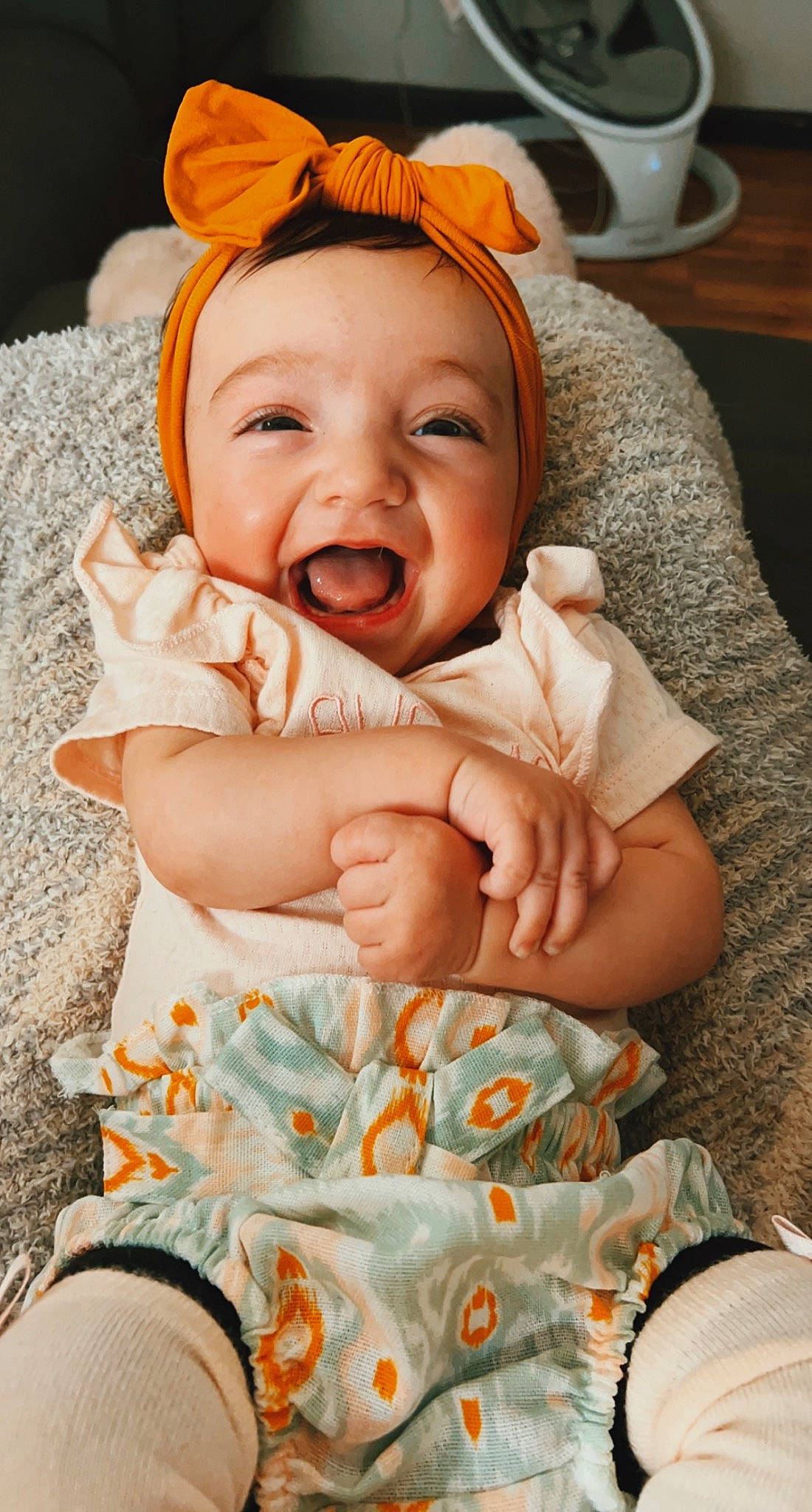 Oaklee is registered to the contest to win money with this photo: baby, baby_laughing, baby_toddler_clothing, cheek, child, chin, comfort, face, facial_expression, fun, happy, iris, lip, mouth, orange, person, pink, skin, smile, textile