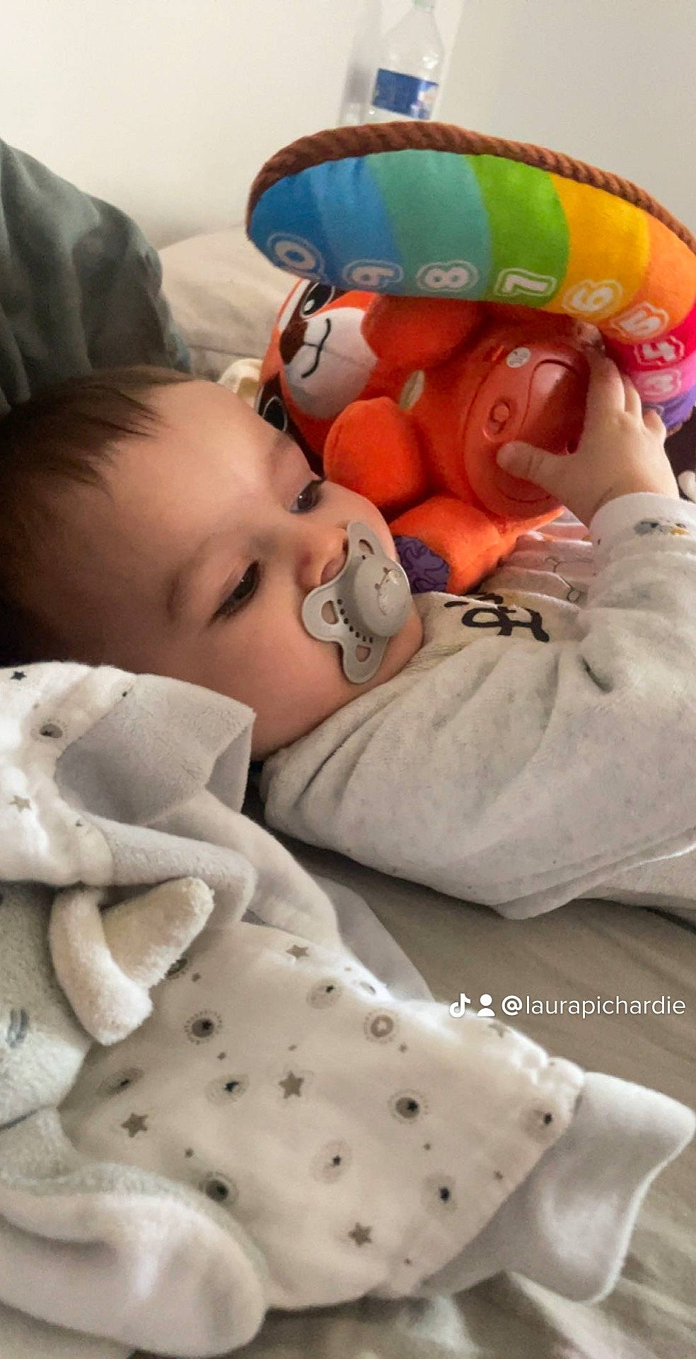 Louis participe au concours pour gagner de l'argent avec cette photo : baby, baby_sleeping, baby_toddler_clothing, cheek, child, comfort, happy, linens, mammal, mouth, nose, organ, person, product, room, skin, stuffed_toy, textile, toddler, toy