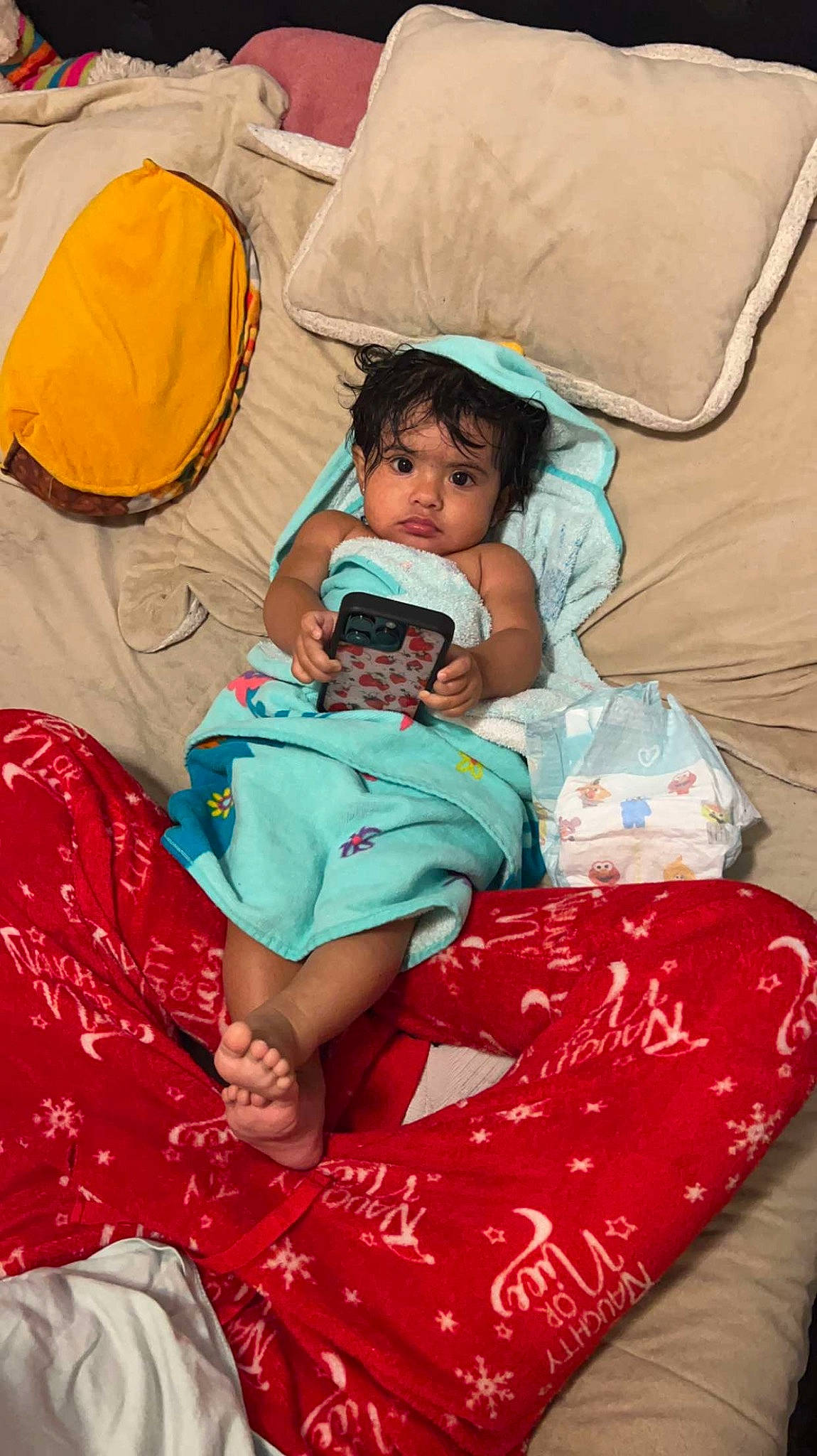 Jaylani joined the competition — help win amazing prizes! baby, bedding, child, comfort, event, fashion_accessory, fun, happy, human_leg, lap, linens, magenta, people, person, pillow, play, room, sitting, textile, throw_pillow