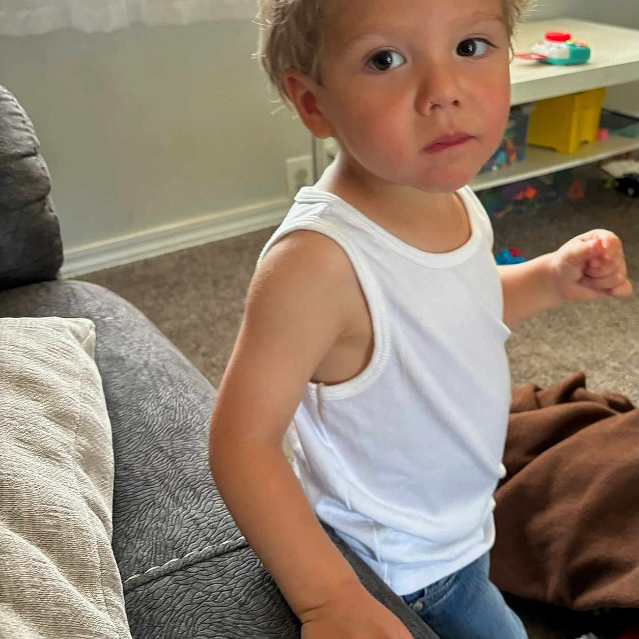 Aj joined the competition — help win amazing prizes! adult, blonde, bodypart, boy, child, clothing, couch, face, finger, furniture, hair, hand, head, male, pants, person, photography, portrait, sitting, t_shirt