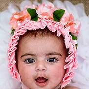 Rubab Kaur is registered to the contest to win money with this photo: baby, child, face, portrait, pink, bonnet, flowers, headwear, cute, expression, skin, eyes, mouth, infant, closeup, adorable, soft, innocent, young, person