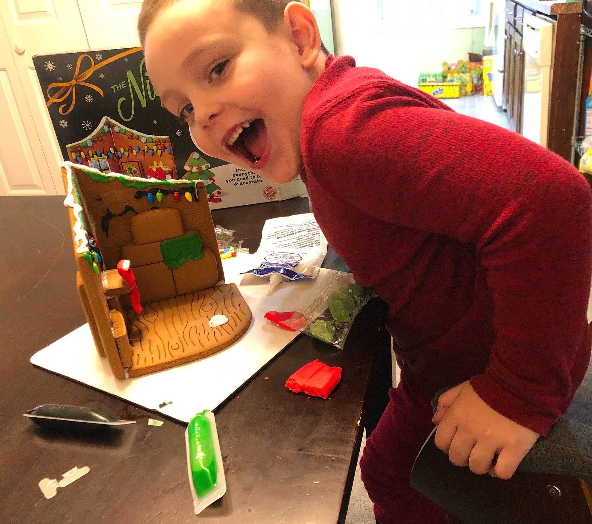 Jaxson joined the competition — help win amazing prizes! box, cardboard, child, christmas, flooring, fun, holiday, learning, lego, person, play, puzzle, room, sitting, smile, t_shirt, toddler, toy, toy_block, visual_arts