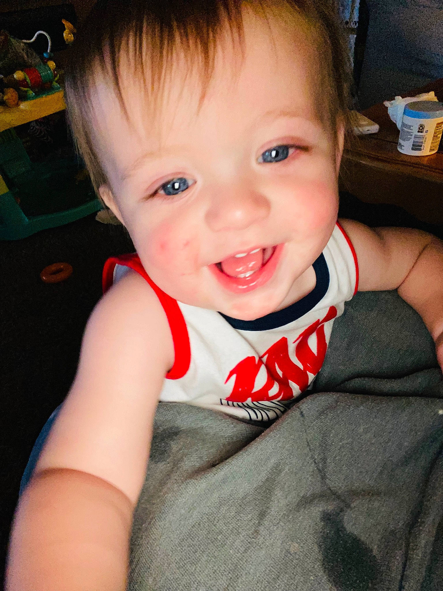 Cedar is registered to the contest to win money with this photo: arm, baby_toddler_clothing, cheek, cool, ear, eyebrow, eyelash, finger, flash_photography, forehead, happy, iris, lip, mouth, neck, nose, person, skin, sleeve, smile