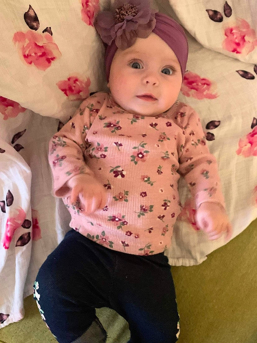 Lorelei joined the competition — help win amazing prizes! baby, baby_toddler_clothing, cheek, child, doll, eye, facial_expression, happy, headwear, magenta, mammal, pattern, peach, person, pink, skin, sleeve, stuffed_toy, textile, toy