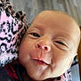 Lucas joined the competition — help win amazing prizes! baby, infant, face, blanket, patterned_blanket, skin, closeup, expression, sleepy, smile, indoors, person, newborn, soft_texture, cute, warm, cozy, head, cheeks, eyes