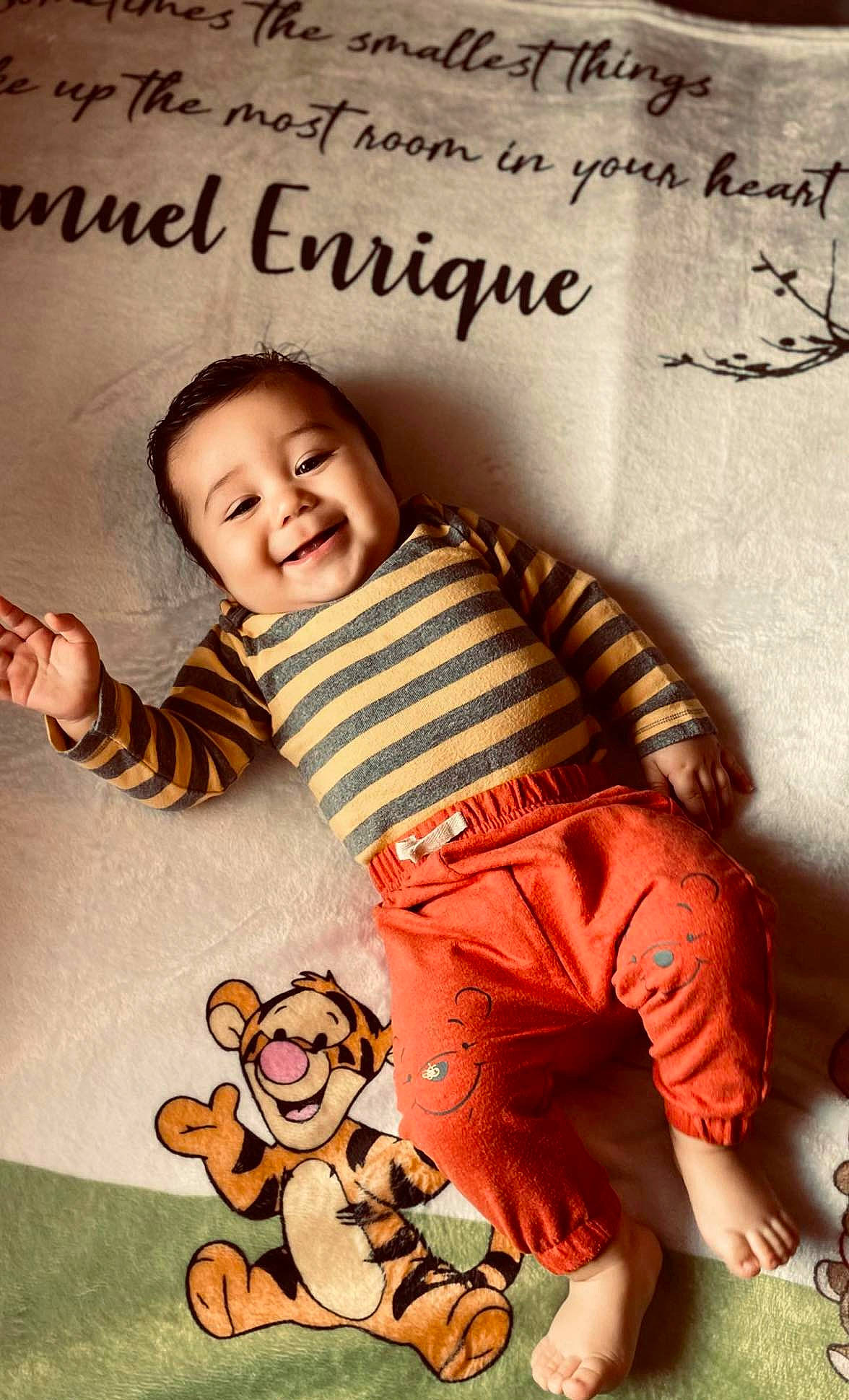 Manuel joined the competition — help win amazing prizes! baby, baby_toddler_clothing, child, facial_expression, finger, font, fun, gesture, handwriting, happy, human, joy, orange, organ, person, product, skin, sleeve, smile, t_shirt