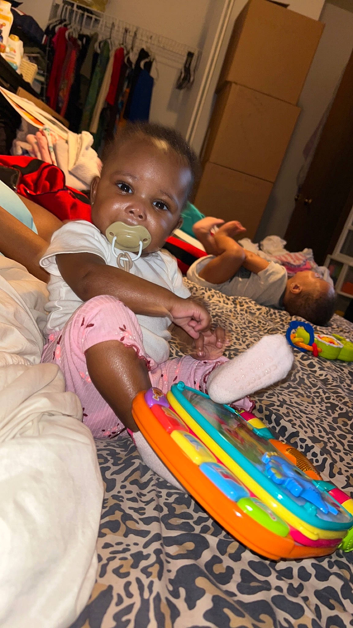 Zyair is registered to the contest to win money with this photo: baby, boardsport, child, event, fun, happy, leisure, musical_instrument, person, play, recreation, room, sharing, sitting, skateboard, smile, surfboard, toddler, toy_vehicle, vacation