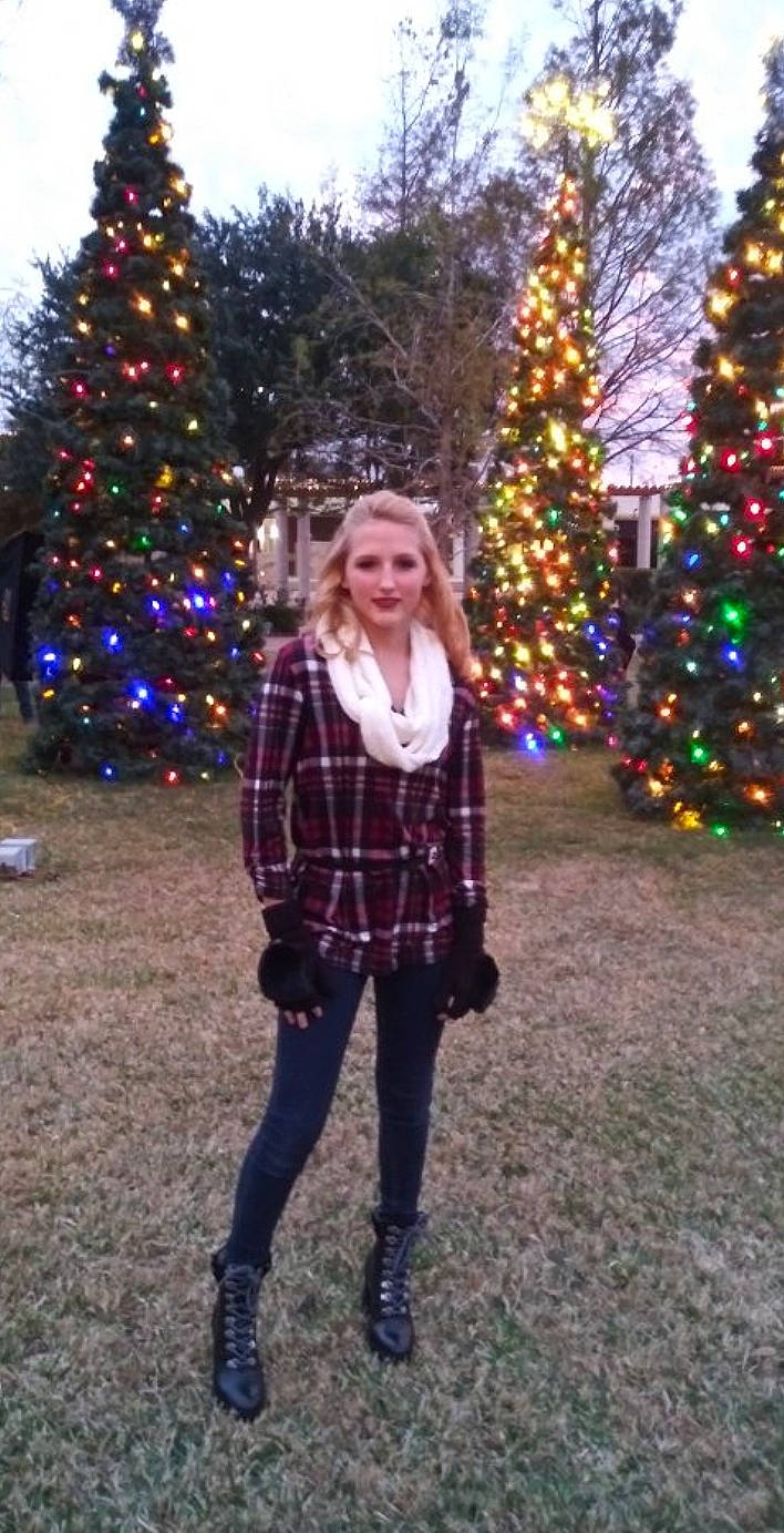 Landyn joined the competition — help win amazing prizes! christmas, christmas_decoration, christmas_eve, christmas_tree, clothing, design, fashion, human_body, joint, leg, outerwear, pattern, person, photograph, plaid, plant, snapshot, standing, tartan, tree