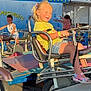 Nevaeh joined the competition — help win amazing prizes! child, girl, amusement_park, ride, motorbike, pigtails, summer, sunlight, happiness, outdoor, play, fun, clothing, shorts, sandals, smile, kids, background, daytime, seat