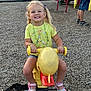 Nevaeh joined the competition — help win amazing prizes! child, girl, playground, spring_rider, yellow, duck, smiling, pigtails, sandals, yellow_shirt, denim_shorts, outdoor, wood_chips, people, play_equipment, happy, fun, summer, casual, park