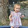 child, toddler, girl, dress, purple, winnie_the_pooh, outdoor, trampoline, tree, wood, smile, cute, nature, grass, playing, young, person, standing, happy, daytime