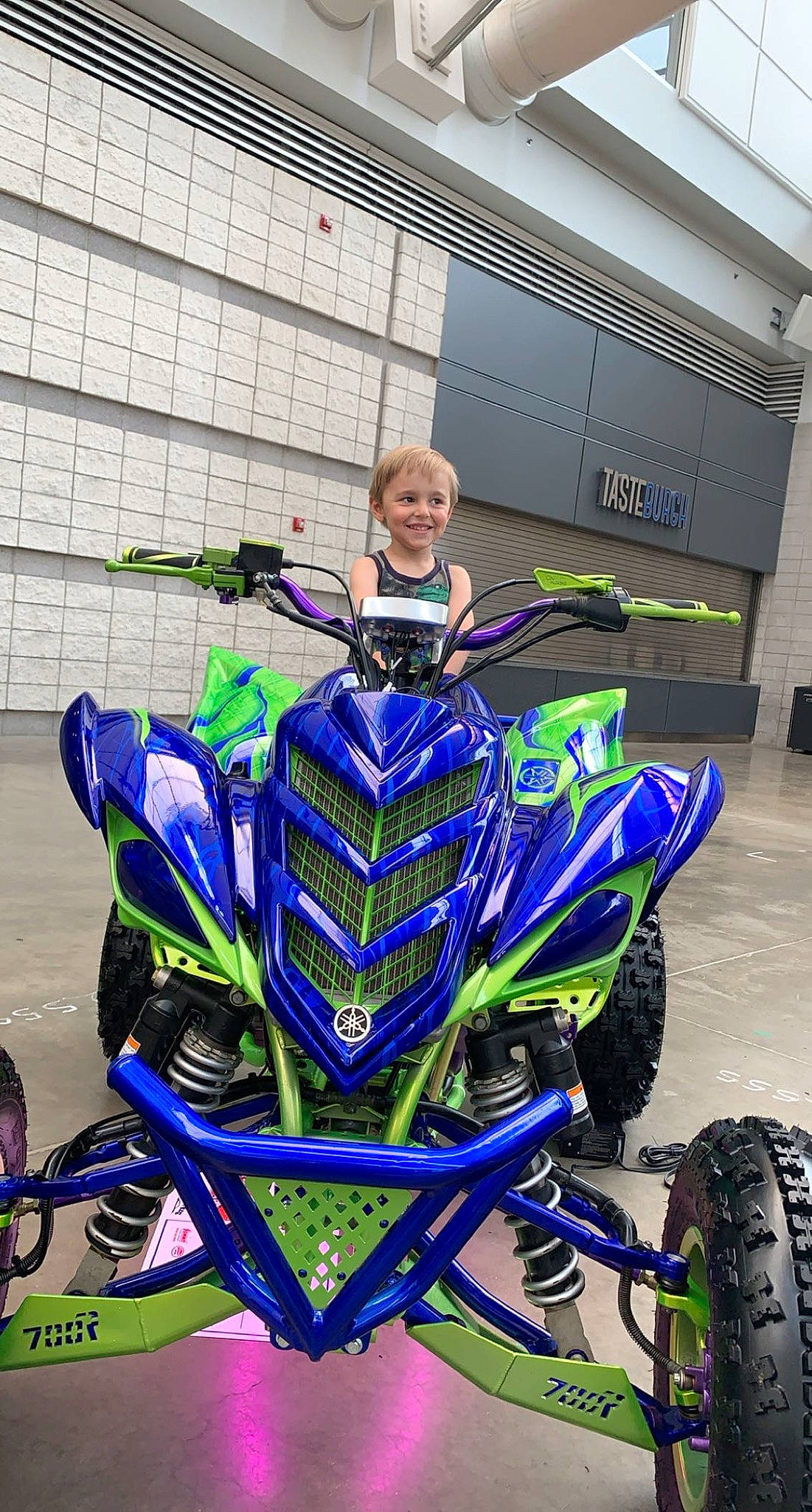 Dakota joined the competition — help win amazing prizes! auto_part, automotive_design, automotive_exterior, automotive_lighting, automotive_tire, automotive_wheel_system, electric_blue, fender, joy, land_vehicle, motor_vehicle, motorcycle, motorcycle_racing, motorsport, person, purple, racing, rim, tire, tread