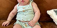 Rhaelynn joined the competition — help win amazing prizes! baby, infant, child, couch, brown, clothing, headband, socks, sitting, cute, expression, indoors, portrait, young, skin, face, hand, legs, button, fabric