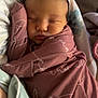 Rhaelynn joined the competition — help win amazing prizes! baby, newborn, sleeping, blanket, swaddle, infant, face, peaceful, soft_lighting, indoors, cozy, maroon, cursive, wrapped, child, portrait, cute, relaxed, person, toddler
