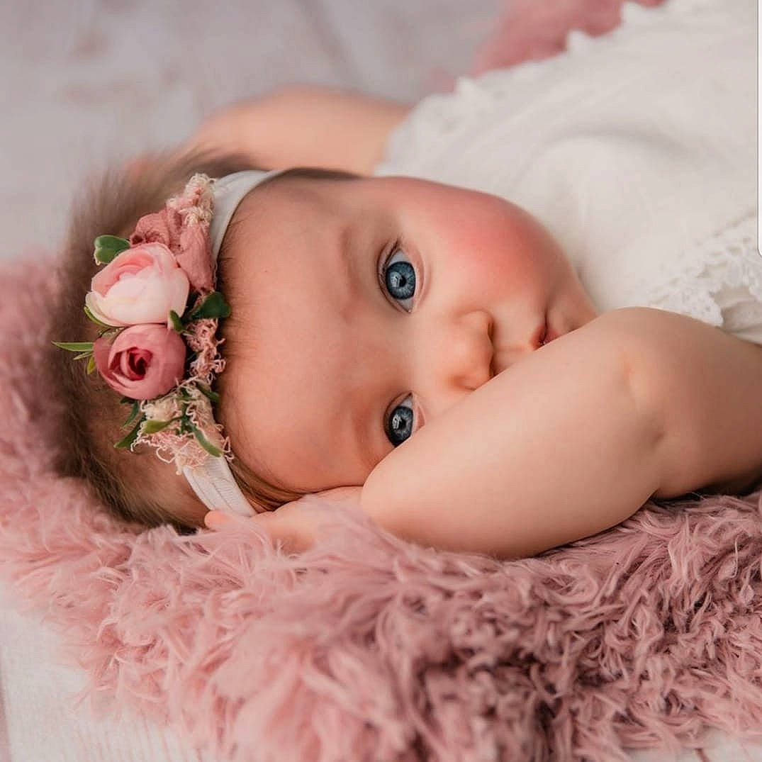 Liberty is registered to the contest to win money with this photo: baby, baby_sleeping, beauty, cheek, child, eye, face, hair_accessory, head, headband, headgear, headwear, iris, lip, mouth, person, photograph, photography, pink, product