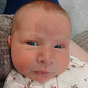 Ada joined the competition — help win amazing prizes! baby, face, infant, closeup, eyes, skin, clothing, pattern, fabric, newborn, portrait, person, cute, expression, soft, head, cheeks, small, child, indoors