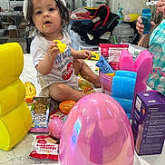 Sahfire joined the competition — help win amazing prizes! bubbles, bunny_ears, carseat, child, countertop, curious, cute, easter, food, holiday, indoor, kitchen, person, pink, plastic_egg, playtime, snacks, toddler, toys, yellow
