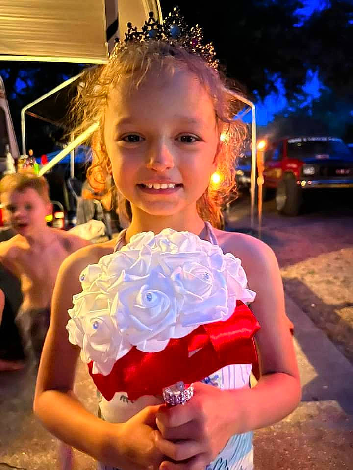 Vanessa joined the competition — help win amazing prizes! beauty, blond, bridal_accessory, bridal_clothing, dress, electric_blue, entertainment, event, facial_expression, flash_photography, formal_wear, fun, gown, happy, headpiece, joy, person, petal, pink, rose