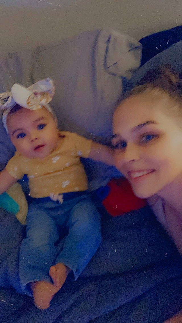 Julianne is registered to the contest to win money with this photo: abdomen, baby, baby_toddler_clothing, cheek, child, fun, happy, iris, joy, lap, mouth, nose, organ, person, room, sitting, skin, smile, textile, toddler