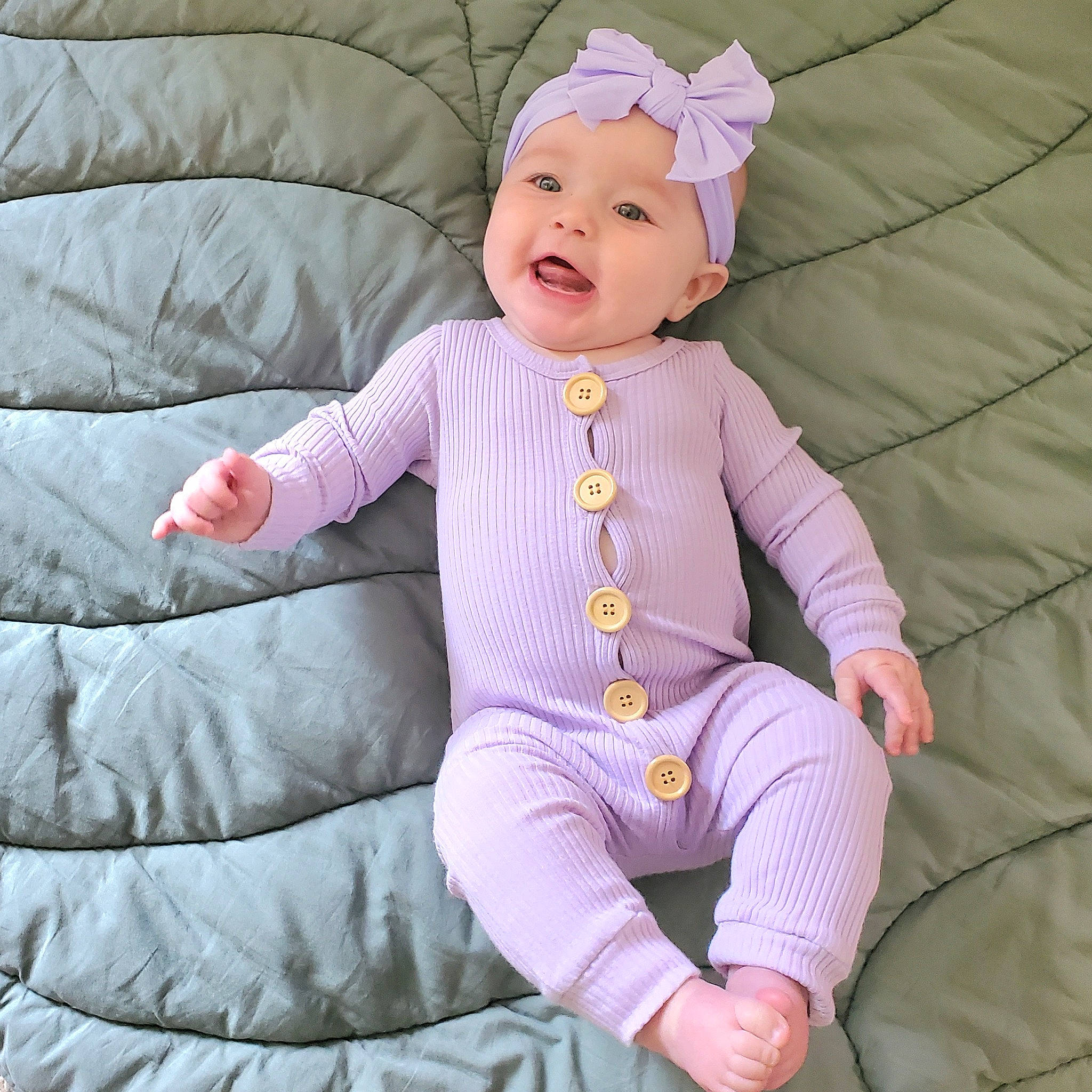 Navi joined the competition — help win amazing prizes! baby, baby_products, baby_toddler_clothing, child, comfort, eye, face, happy, headgear, headwear, human_body, magenta, outerwear, person, personal_protective_equipment, pink, purple, sitting, sleeve, smile