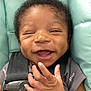 Uriah joined the competition — help win amazing prizes! baby, car_seat, child, clothing, cute, fabric, face, hand, happy, indoors, infant, padding, pattern, person, portrait, safety, seat, seatbelt, smiling, young