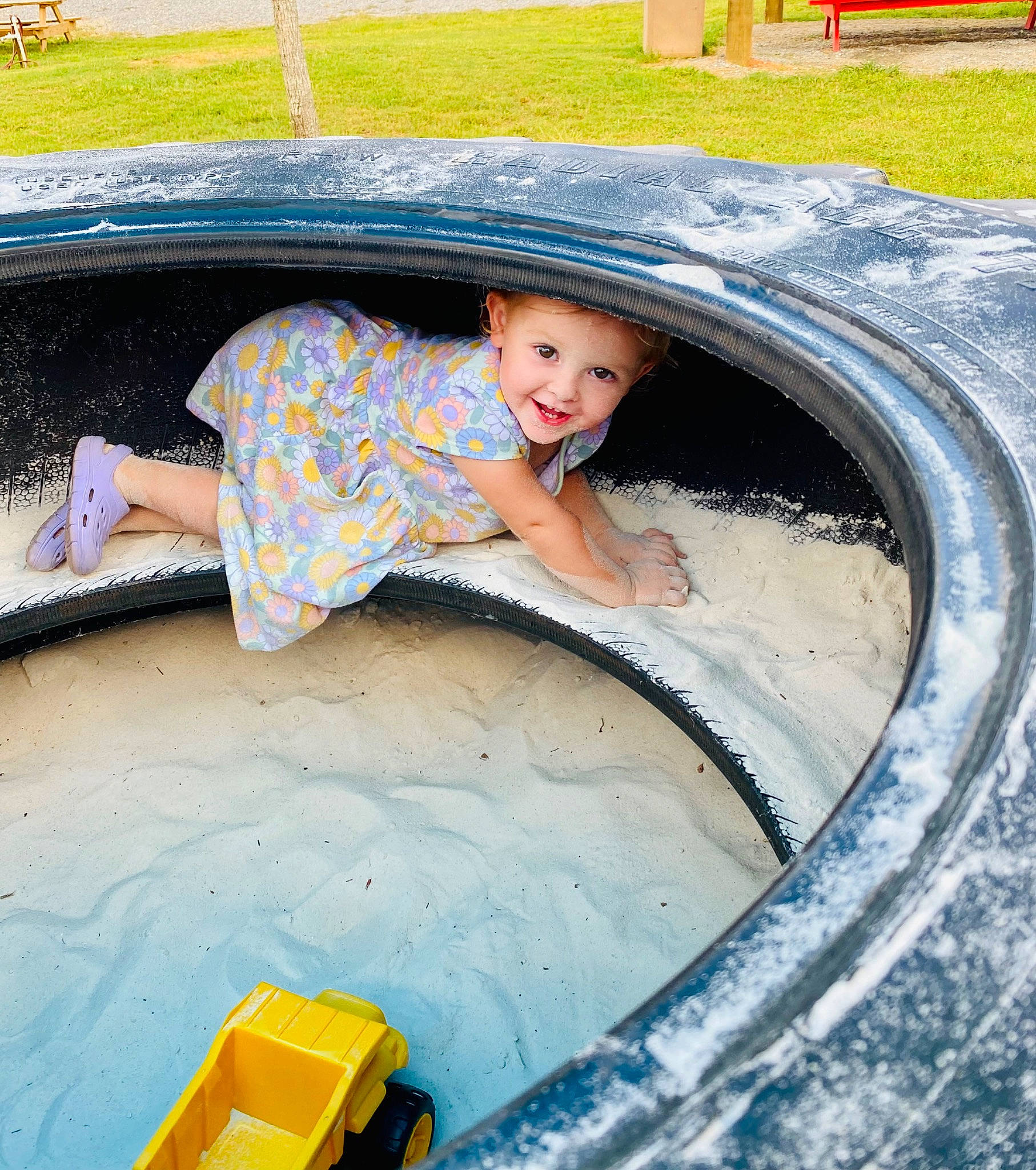 Brook is registered to the contest to win money with this photo: asphalt, auto_part, automotive_exterior, automotive_tire, automotive_wheel_system, bumper, child, city, concrete, electric_blue, fun, headwear, hood, joy, leisure, motor_vehicle, person, recreation, smile, tire