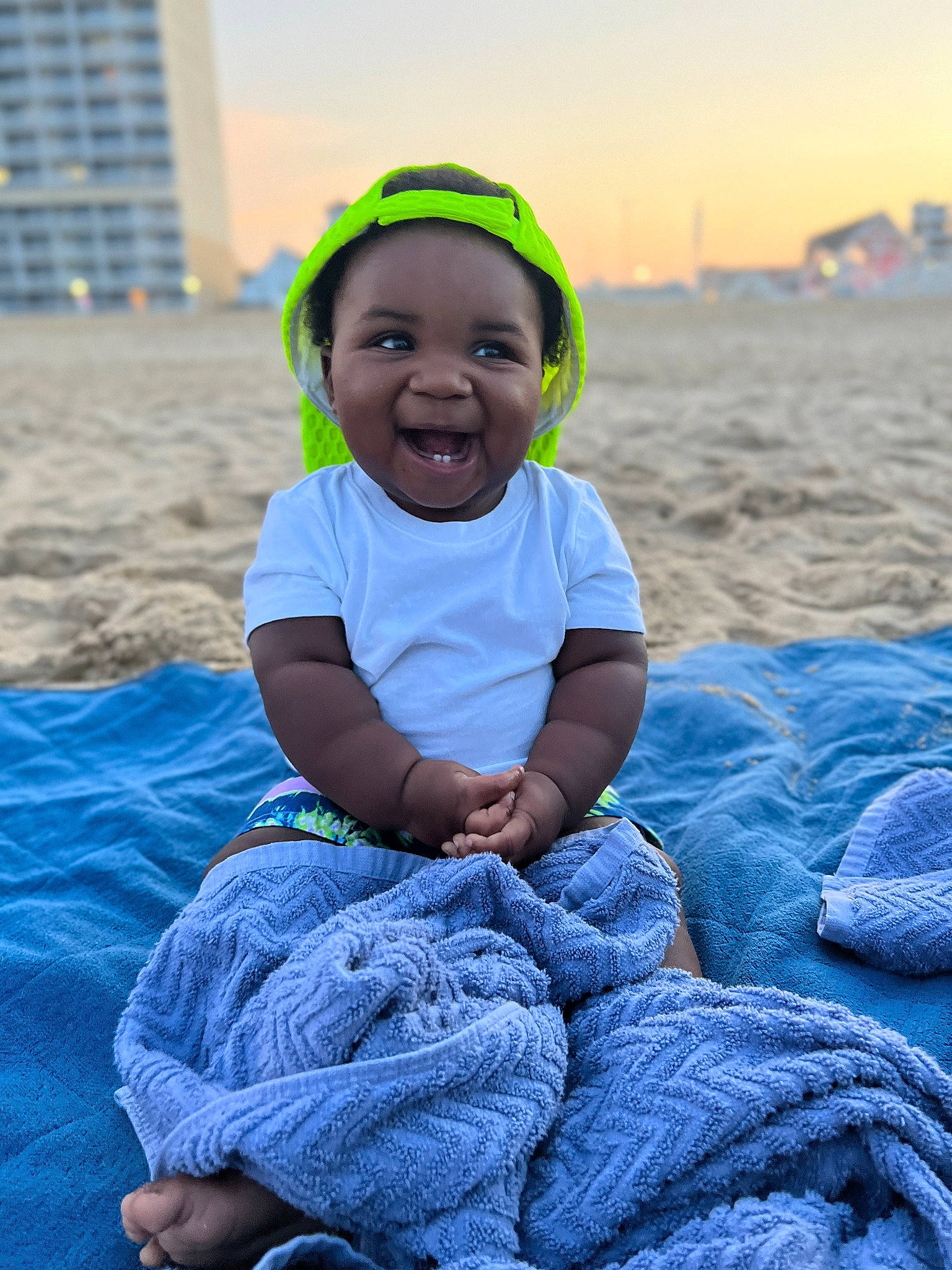 Adriel joined the competition — help win amazing prizes! azure, baby, baby_toddler_clothing, black, blue, facial_expression, flash_photography, fun, grass, happy, people, person, photograph, purple, sand, sky, smile, standing, summer, sunlight