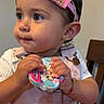 Araceli is registered to the contest to win money with this photo: baby, birthday, bracelet, child, clothing, crown, cute, earring, face, happy, indoor, minnie_mouse, overalls, person, pink, portrait, seat, table, toddler, toy