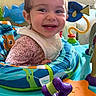 Araceli joined the competition — help win amazing prizes! activity_center, baby, blue, child, clothing, colorful, disney, face, green, happy, indoor, infant, orange, person, pink, plastic_toy, playtime, purple, smiling, toy