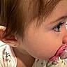 Araceli joined the competition — help win amazing prizes! baby, profile, face, pacifier, earring, onesie, child, infant, closeup, soft_hair, cute, sleepwear, pattern, pink, mouth, skin, portrait, young_child, looking, indoors