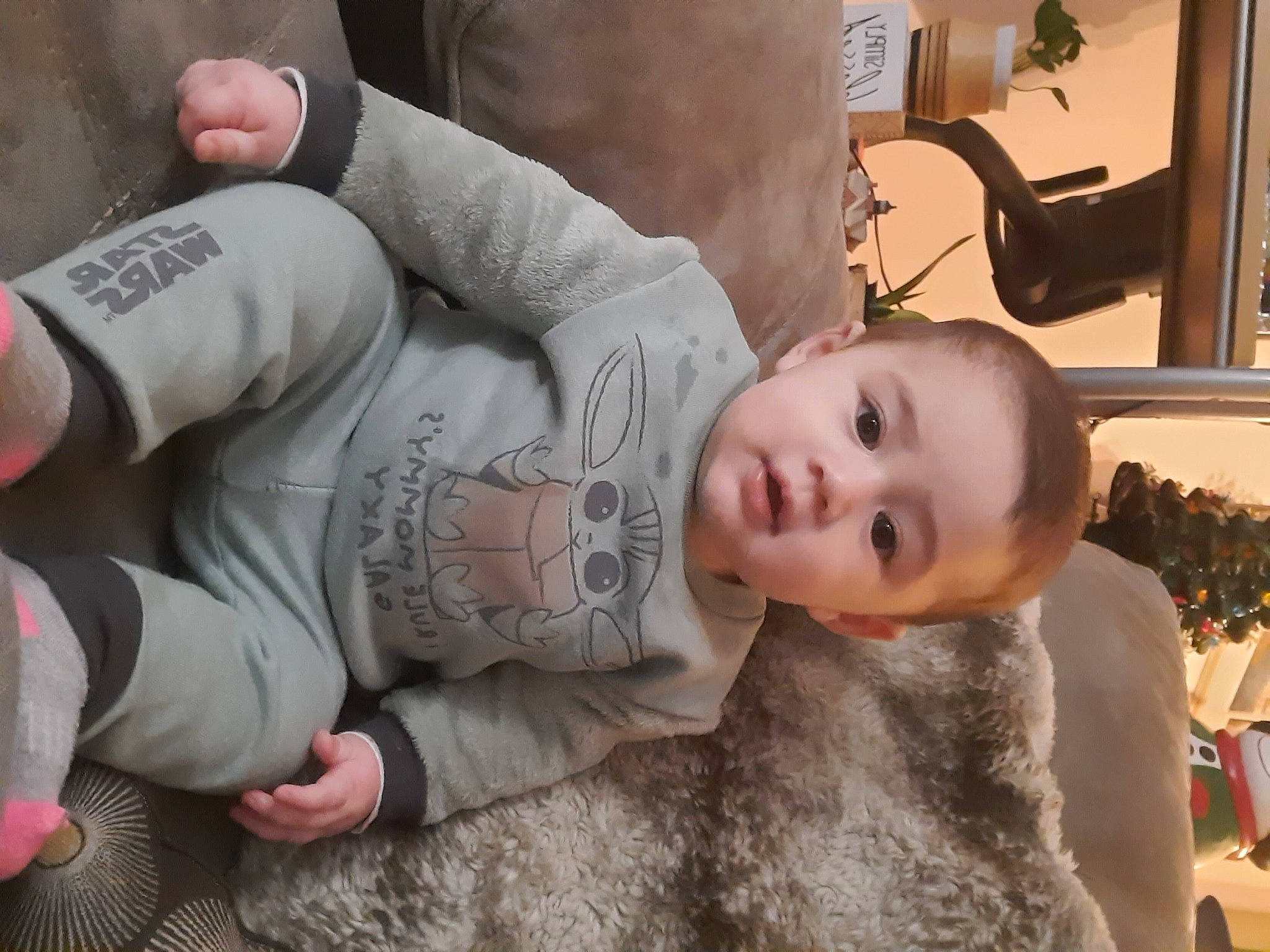 Malia is registered to the contest to win money with this photo: baby, baby_products, baby_toddler_clothing, cheek, child, comfort, flooring, fur, human_leg, knee, nail, pattern, person, picture_frame, sitting, skin, sleeve, thigh, toddler, tree